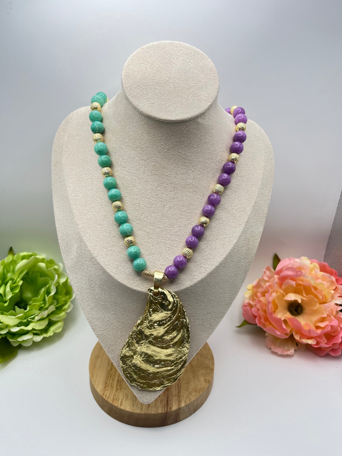 Colección “ Jardín Botánico Dorado” Nombre “ Ostra imperial de Jade y Amatista”